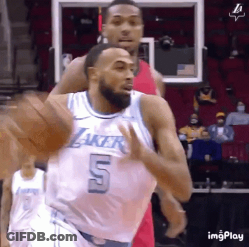 A Basketball Player With The Number 5 On His Jersey Is Running On The Court GIF