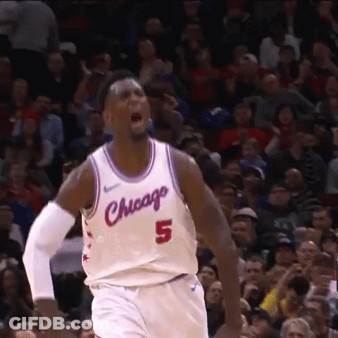 A Basketball Player With The Number 5 On His Jersey Is Screaming In Front Of A Crowd GIF