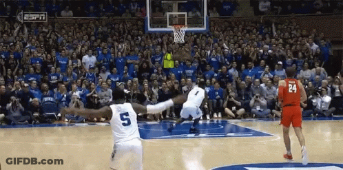 A Basketball Player With The Number 5 On His Jersey Jumps In The Air GIF