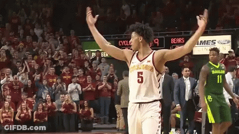 A Basketball Player With The Number 5 On His Jersey Stands On The Court GIF