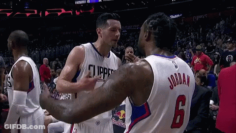 A Basketball Player With The Number 6 On His Jersey Is Hugging Another Player GIF