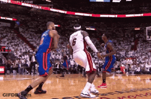 A Basketball Player With The Number 6 On His Jersey Is Jumping In The Air GIF