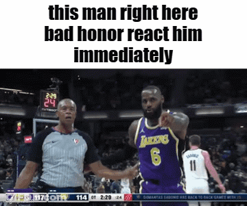 A Basketball Player With The Number 6 On His Jersey Is Shaking Hands With A Referee During A Game GIF