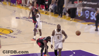 A Basketball Player With The Number 6 On His Shorts Dribbles The Ball GIF