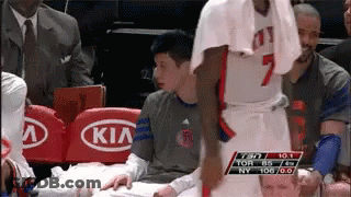 A Basketball Player With The Number 7 On His Jersey Is Talking To A Kid GIF