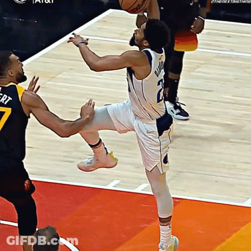 A Basketball Player With The Number 7 On The Back Of His Shirt GIF
