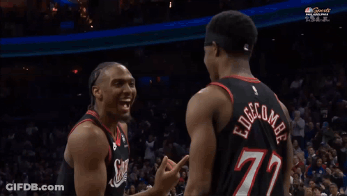 A Basketball Player With The Number 77 On His Back Is Laughing GIF