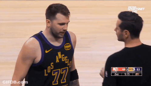 A Basketball Player With The Number 77 On His Jersey GIF