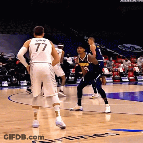 A Basketball Player With The Number 77 On His Shirt GIF
