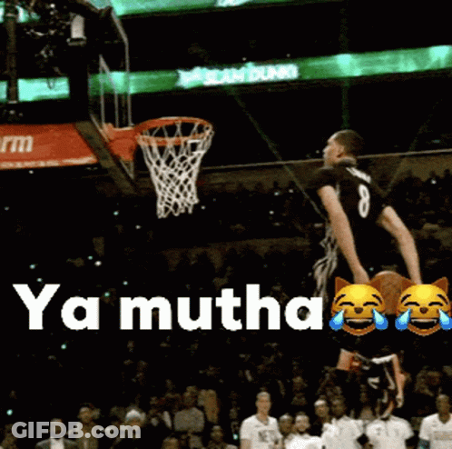 A Basketball Player With The Number 8 On His Jersey Is Jumping In The Air To Dunk The Ball GIF