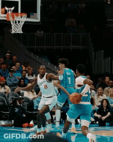 A Basketball Player With The Number 8 On The Back Of His Shirt GIF
