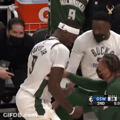 A Basketball Player With The Number 9 On His Back GIF