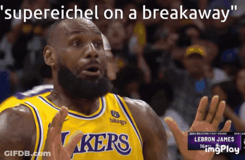 A Basketball Player With The Word Lakers On His Shirt GIF