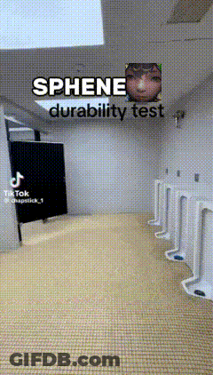 A Bathroom With Urinals And A Sign That Says ' Sphene Durability Test ' On It GIF