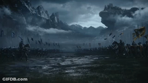 A Battle Scene With A Castle In The Distance GIF