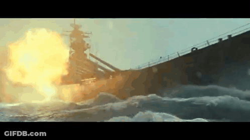 A Battleship Is Exploding In The Ocean . GIF