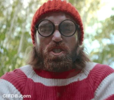 A Bearded Man Wearing Glasses And A Red Hat GIF