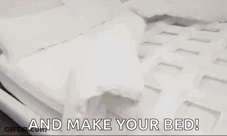 A Bedroom With A Bed And The Words `` And Make Your Bed '' Written On It . GIF