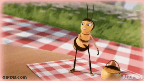 A Bee From The Movie Bee Movie Is Standing On A Checkered Picnic Blanket . GIF