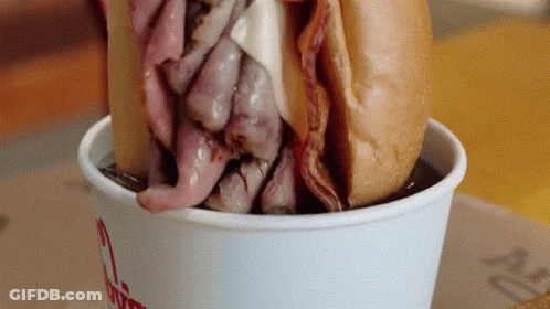 A Beef Sandwich Is In A Cup That Says Wendy 'S GIF