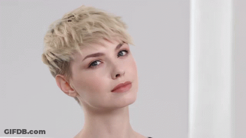 A Before And After Photo Of A Woman With A Textured Pixie Hairstyle GIF