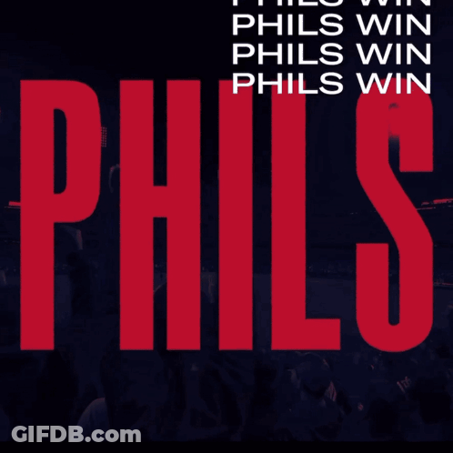 A Bell With Stars On It Is Lit Up In A Dark Room GIF
