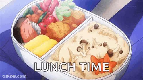 A Bento Box Filled With A Variety Of Food And The Words Lunch Time Written On It . GIF
