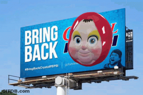A Billboard That Says Bring Back Crystal Pepsi With A Cartoon Face On It GIF
