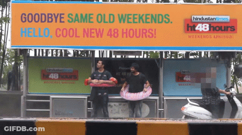 A Billboard That Says Goodbye Same Old Weekends GIF