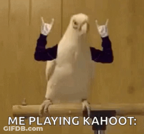 A Bird Is Making A Devil Horns Sign With Its Arms While Sitting On A Branch . GIF