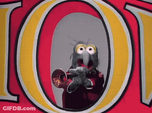 A Bird Is Playing A Trumpet In Front Of The Letter O. GIF