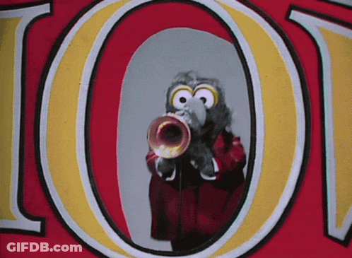 A Bird Is Playing A Trumpet In Front Of The Letter O On A Red And Yellow Background GIF
