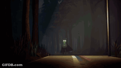 A Bird With A Green Head Is Standing In The Dark GIF