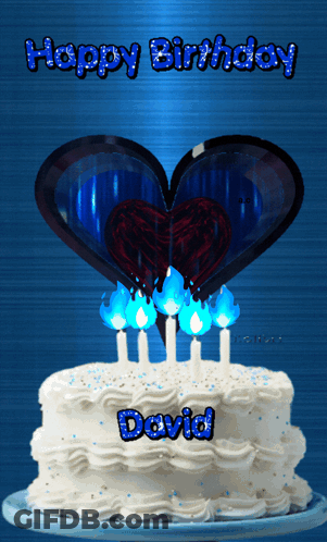 A Birthday Cake For David With Candles And A Heart On Top GIF