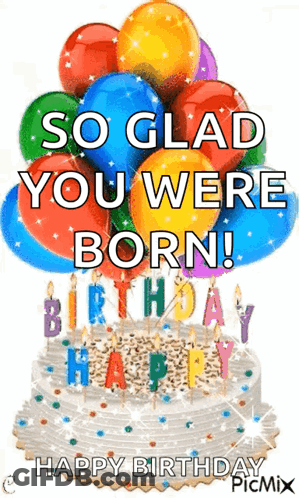 A Birthday Cake With Balloons And Candles On It . GIF