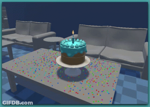 A Birthday Cake With Blue Frosting And A Candle GIF