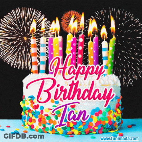 A Birthday Cake With Candles And Fireworks Behind It GIF