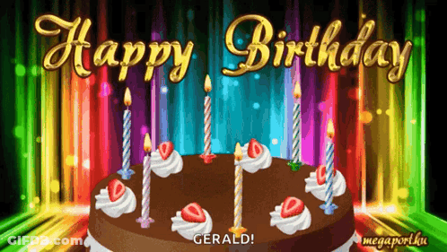A Birthday Cake With Candles And Strawberries On It GIF