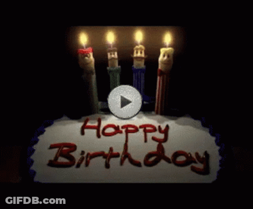 A Birthday Cake With Candles And The Words Happy Birthday Written On It GIF