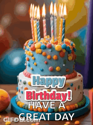 A Birthday Cake With Candles On It And The Words `` Happy Birthday Have A Great Day '' GIF