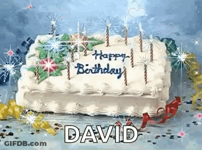 A Birthday Cake With Candles On It That Says Happy Birthday David GIF