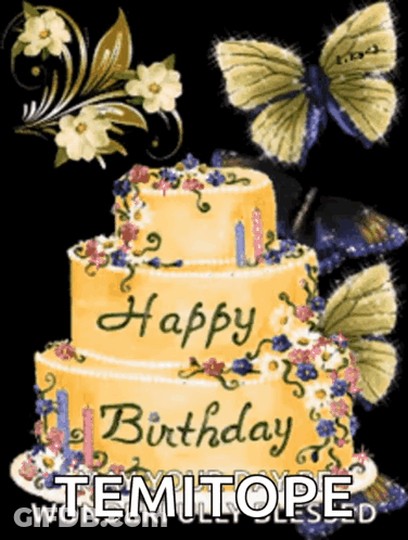 A Birthday Cake With Flowers And Butterflies Says Happy Birthday GIF