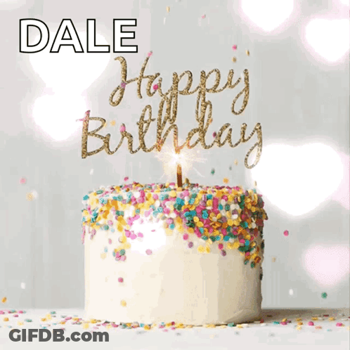 A Birthday Cake With Sprinkles And A Lit Candle That Says Happy Birthday GIF