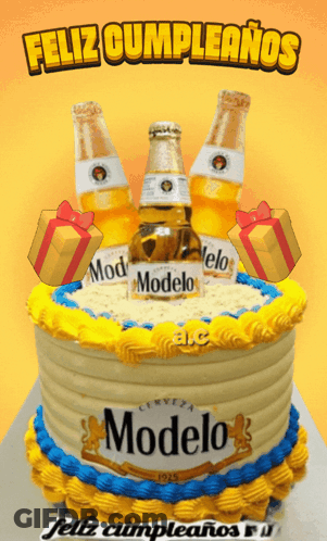 A Birthday Cake With Three Bottles Of Modelo On Top GIF