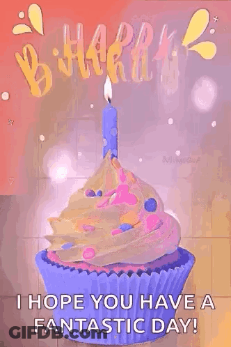 A Birthday Cupcake With A Candle On Top Of It . GIF