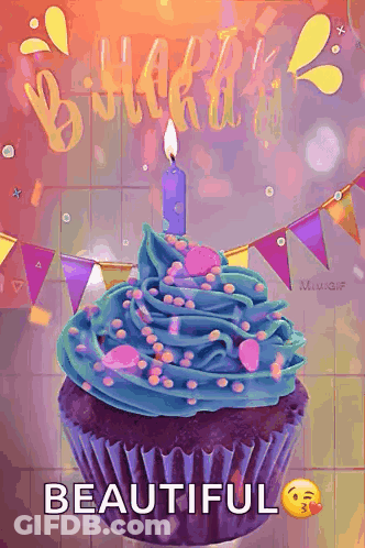 A Birthday Cupcake With Blue Frosting And Sprinkles And A Lit Candle GIF
