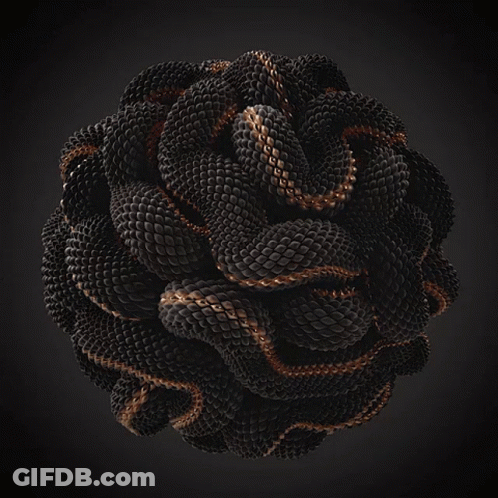A Black And Gold Sphere With A Snake Skin Texture GIF
