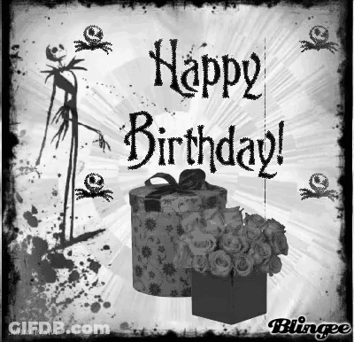 A Black And White Birthday Card With A Gift Box And Flowers GIF