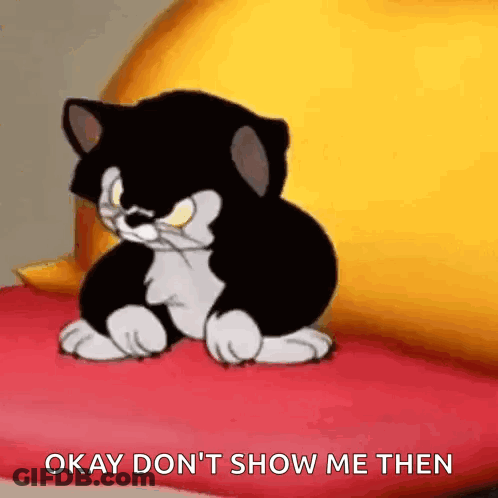 A Black And White Cartoon Cat Is Sitting On A Red Pillow With The Words `` Okay Don 'T Show Me Then '' . GIF