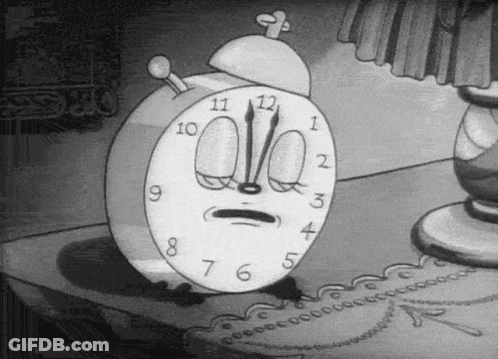 A Black And White Cartoon Clock With A Face On It GIF